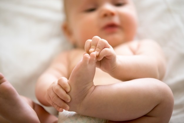 First Year Baby Milestones: Grasping Skills
